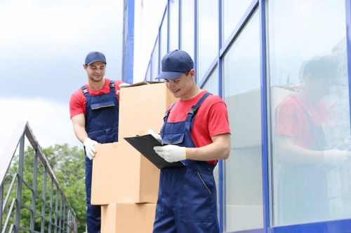 Local movers loading commercial items for transport in Wandsworth