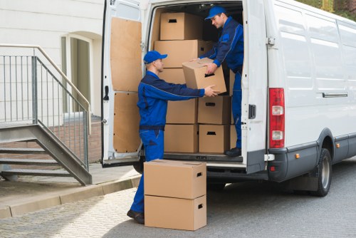 Commercial moving team preparing office furniture for relocation in Wandsworth