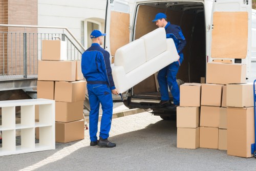 Packed office boxes and labelled equipment ready for a local Wandsworth business move