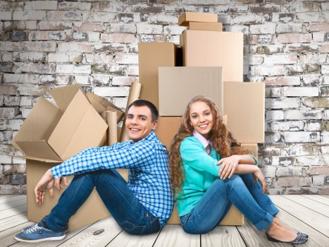 Packed office furniture and business equipment ready for relocation