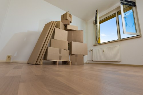 Packed boxes and furniture ready for storage collection
