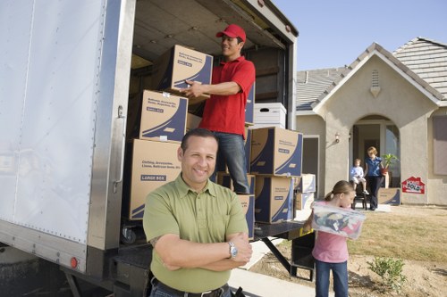 Packed boxes and furniture ready for a flat relocation