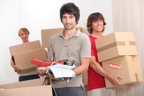 Moving van and packed boxes for a Wandsworth flat relocation
