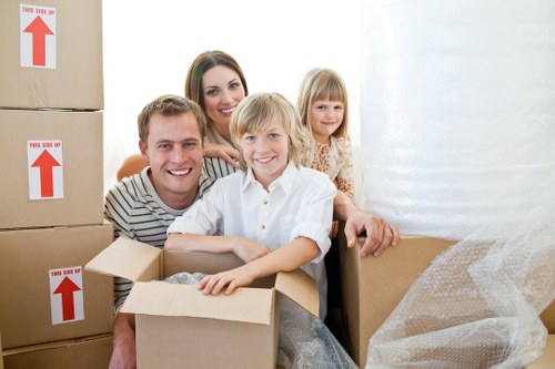 Professional movers loading household furniture for a Wandsworth relocation